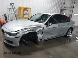 2014 BMW 3 Series 328d xDrive with VIN WBA3D5C55EF147308, listed as a IAAI auction lot 41499435 with 104,941 mi miles. Bid and sale history available at carsss.com. Image 15.