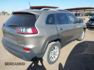 2019 Jeep Cherokee Latitude with VIN 1C4PJLCB2KD474165, listed as a IAAI auction lot 42100594 with 91,363 mi miles and . Bid and sale history available at DreamBid. Image 4.