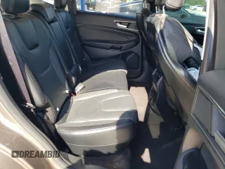 2019 Ford Edge Titanium z VIN 2FMPK3K94KBB39034, wystawiony jako Copart lot #51453215 z przebiegiem 141 741 mil mil oraz Nie do naprawy • Non repairable. Historia ofert i sprzedaży dostępna na DreamBid. Obrazek 11.