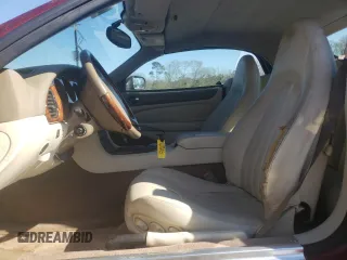 1999 Jaguar XK z VIN SAJGX2043XC032962, wystawiony jako Copart lot #49312155 z przebiegiem 74 662 mil mil oraz Szkoda całkowita • Salvage title. Historia ofert i sprzedaży dostępna na DreamBid. Obrazek 7.