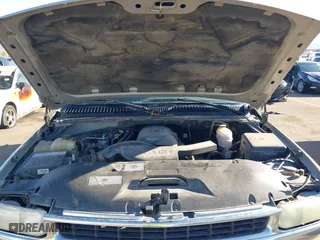 2005 Chevrolet Tahoe LS with VIN 1GNEK13T95J124661, listed as a IAAI auction lot 41885297 with 309,905 mi miles. Bid and sale history available at carsss.com. Image 10.