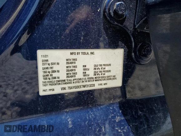 2022 Tesla Model Y Long Range z VIN 7SAYGDEE7NF313228, wystawiony jako Copart lot #55060705 z przebiegiem 32 238 mil mil oraz Szkoda całkowita • Salvage title. Historia ofert i sprzedaży dostępna na DreamBid. Obrazek 13.
