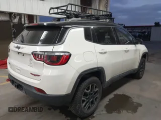 2019 Jeep Compass Trailhawk with VIN 3C4NJDDB8KT668110, listed as a IAAI auction lot 41700848 with 75,855 mi miles and . Bid and sale history available at carsss.com. Image 4.