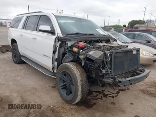 2019 GMC Yukon XL SLT with VIN 1GKS1GKC1KR384332, listed as a IAAI auction lot 41232450 with 109,219 mi miles. Bid and sale history available at carsss.com. Image 1.
