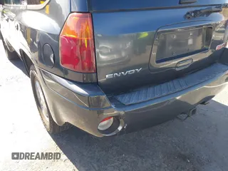 2006 GMC Envoy SLT with VIN 1GKDS13S962184712, listed as a IAAI auction lot 41250740 with 226,986 mi miles. Bid and sale history available at carsss.com. Image 12.