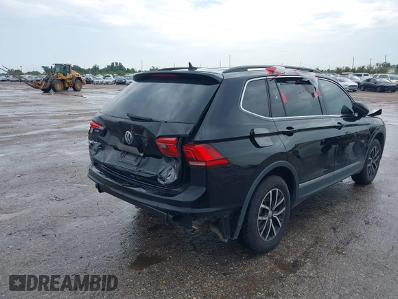 2021 Volkswagen Tiguan SE z VIN 3VV3B7AX7MM004286, wystawiony jako IAAI lot #39864219 z przebiegiem 67 429 mil mil oraz . Historia ofert i sprzedaży dostępna na DreamBid. Obrazek 4.