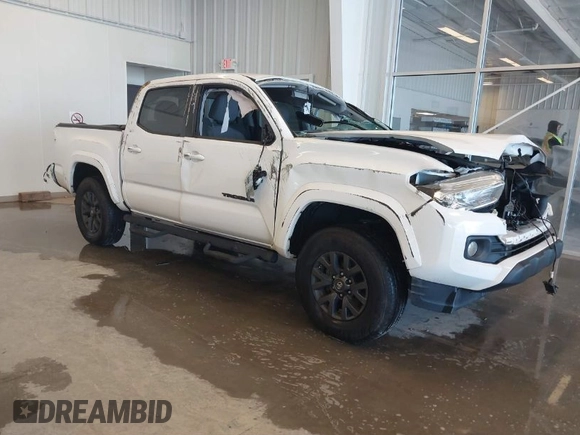 2020 Toyota Tacoma SR5 with VIN 3TMAZ5CN5LM124703, listed as a IAAI auction lot 41017478 with 47,627 mi miles and . Bid and sale history available at DreamBid. Image 1.
