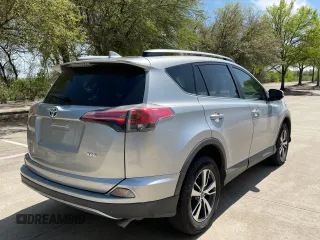 2018 Toyota RAV4 XLE with VIN 2T3WFREV8JW496356, listed as a Copart auction lot 51367765 with 71,049 mi miles and Clean Title. Bid and sale history available at DreamBid. Image 4.