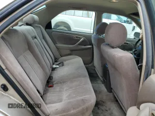 1998 Toyota Camry LE z VIN JT2BF22K8W0133091, wystawiony jako Copart lot #47691625 z przebiegiem 214 743 mil mil oraz Szkoda całkowita • Salvage title. Historia ofert i sprzedaży dostępna na DreamBid. Obrazek 10.