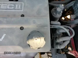 2006 Chevrolet Aveo LS z VIN KL1TD56696B662643, wystawiony jako Copart lot #82846974 z przebiegiem 169 780 mil mil oraz Czysty tytuł • Clean title. Historia ofert i sprzedaży dostępna na DreamBid. Obrazek 13.