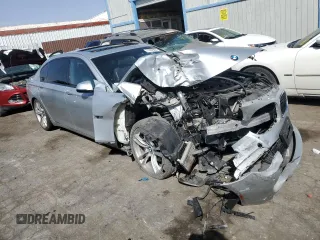 2015 BMW 7 Series 740Li with VIN WBAYE4C52FD947168, listed as a Copart auction lot 71287564 with 103,444 mi miles and Salvage Title. Bid and sale history available at DreamBid. Image 4.