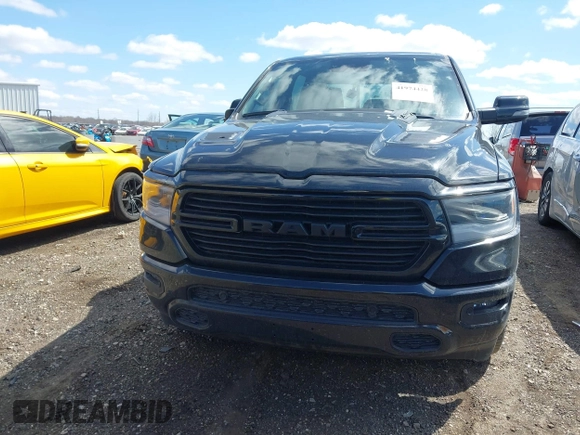 2023 Ram 1500 Laramie with VIN 1C6SRFJT6PN542105, listed as a IAAI auction lot 41974428 with 74,489 mi miles and . Bid and sale history available at DreamBid. Image 12.