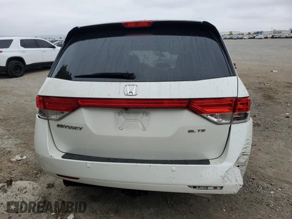 2014 Honda Odyssey Touring z VIN 5FNRL5H91EB089813, wystawiony jako Copart lot #58674275 z przebiegiem Nie podano mil oraz Szkoda całkowita • Salvage title. Historia ofert i sprzedaży dostępna na DreamBid. Obrazek 6.