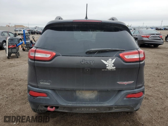 2015 Jeep Cherokee Trailhawk with VIN 1C4PJMBB6FW574108, listed as a Copart auction lot 57798475 with 105,022 mi miles and Salvage title. Bid and sale history available at DreamBid. Image 6.