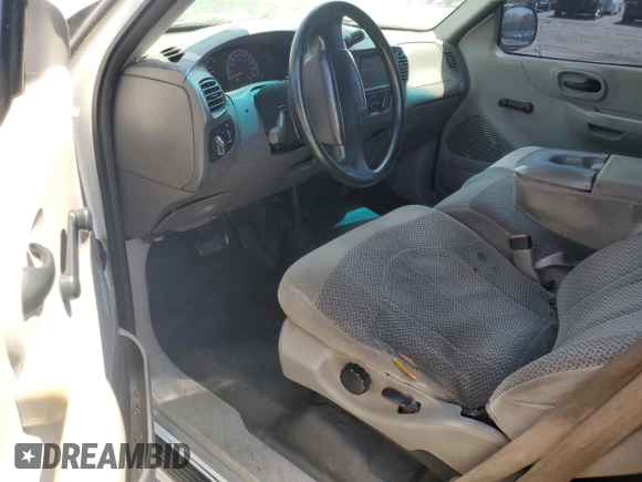 1999 Ford F-150 XL with VIN 1FTZX0726XKA98752, listed as a Copart auction lot 58986695 with Not provided miles and Salvage title. Bid and sale history available at DreamBid. Image 8.