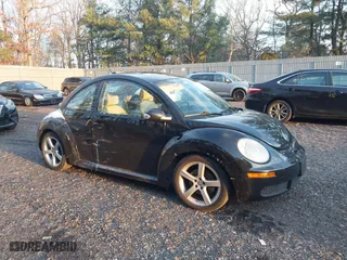 2010 Volkswagen New Beetle Coupe with VIN 3VWRG3AG9AM013681, listed as a IAAI auction lot 41177108 with 104,139 mi miles. Bid and sale history available at carsss.com. Image 1.