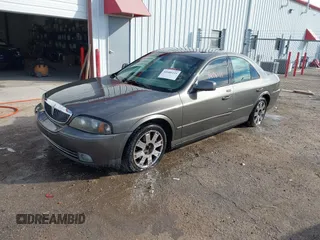 2004 Lincoln LS with VIN 1LNHM87A04Y671711, listed as a IAAI auction lot 41606121 with 1 mi miles. Bid and sale history available at carsss.com. Image 2.
