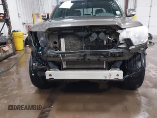 2014 Toyota Tacoma PreRunner with VIN 3TMJU4GNXEM164507, listed as a IAAI auction lot 42118984 with 183,101 mi miles and . Bid and sale history available at DreamBid. Image 6.