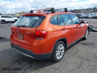 2013 BMW X1 xDrive28i with VIN WBAVL1C58DVR90699, listed as a IAAI auction lot 41809183 with 96,986 mi miles. Bid and sale history available at carsss.com. Image 4.