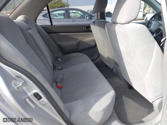 2004 Mitsubishi Lancer ES with VIN JA3AJ26E54U052124, listed as a IAAI auction lot 41804473 with 165,786 mi miles. Bid and sale history available at carsss.com. Image 8.