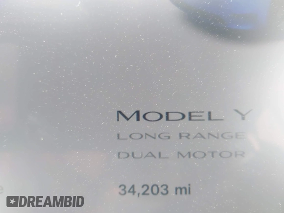 2023 Tesla Model Y Long Range with VIN 7SAYGDEE2PF696336, listed as a IAAI auction lot 41894686 with 34,203 mi miles. Bid and sale history available at carsss.com. Image 15.