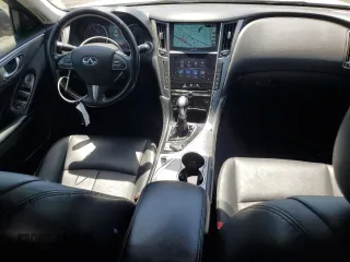2014 Infiniti Q50 with VIN JN1BV7AP4EM676534, listed as a Copart auction lot 60830545 with 94,948 mi miles and Salvage title. Bid and sale history available at DreamBid. Image 8.