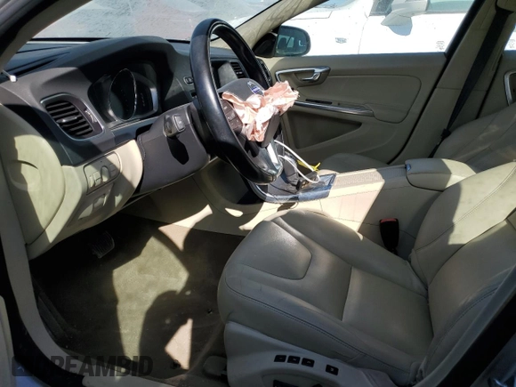 2015 Volvo V60 z VIN YV1612SC1F1191466, wystawiony jako Copart lot #64906184 z przebiegiem 89 444 mil mil oraz Szkoda całkowita • Salvage title. Historia ofert i sprzedaży dostępna na DreamBid. Obrazek 7.