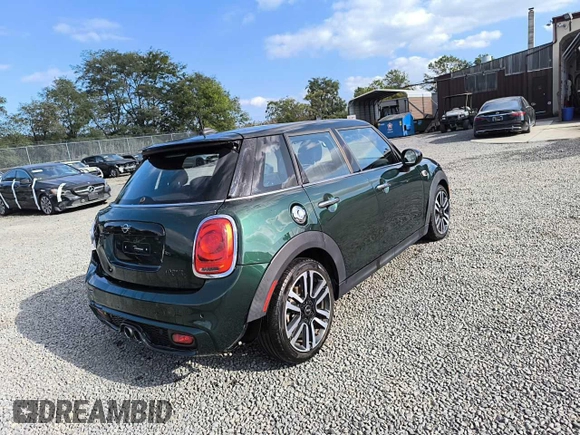 2019 MINI Hardtop 4 Door Cooper S with VIN WMWXU3C57K2H87810, listed as a Copart auction lot 54734575 with 39,785 mi miles and Salvage Title. Bid and sale history available at DreamBid. Image 4.