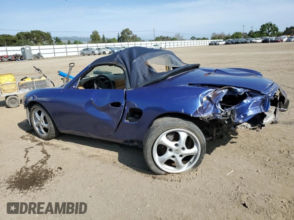 1998 Porsche Boxster с VIN WP0CA2989WU626453, выставлен на аукционе Copart как лот 54971925 с пробегом 116 461 миль миль и На запчасти • Non repairable. История ставок и продаж доступна на DreamBid. Изображение 2.