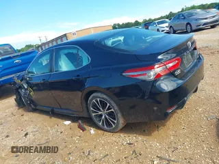 2018 Toyota Camry LE z VIN 4T1B11HKXJU652275, wystawiony jako IAAI lot #42245625 z przebiegiem 49 596 mil mil oraz . Historia ofert i sprzedaży dostępna na DreamBid. Obrazek 14.