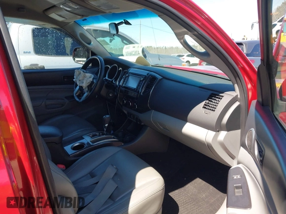 2014 Toyota Tacoma with VIN 5TFLU4EN4EX095917, listed as a IAAI auction lot 41820691 with 59,823 mi miles and . Bid and sale history available at DreamBid. Image 5.
