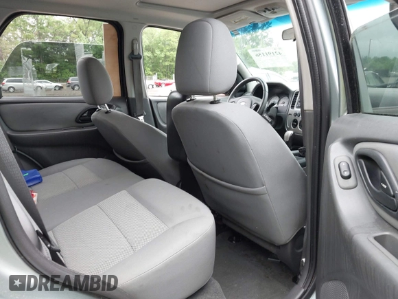 2007 Ford Escape XLT with VIN 1FMCU03137KA12966, listed as a IAAI auction lot 42191156 with 180,000 mi miles and . Bid and sale history available at DreamBid. Image 8.