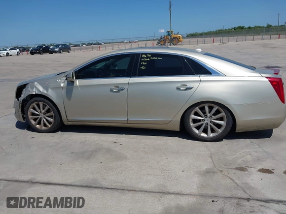 2014 Cadillac XTS Premium with VIN 2G61P5S33E9157607, listed as a IAAI auction lot 42004612 with 111,047 mi miles and . Bid and sale history available at DreamBid. Image 14.