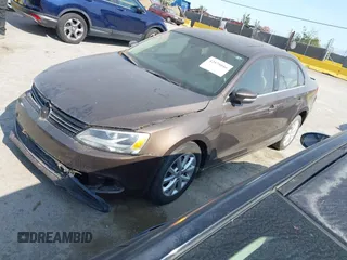 2014 Volkswagen Jetta SE with VIN 3VWD17AJ7EM385606, listed as a IAAI auction lot 42575046 with 86,889 mi miles and . Bid and sale history available at DreamBid. Image 2.