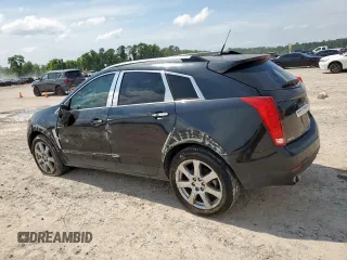 2012 Cadillac SRX Premium Collection z VIN 3GYFNCE39CS526425, wystawiony jako Copart lot #60557615 z przebiegiem 161 217 mil mil oraz Szkoda całkowita • Salvage title. Historia ofert i sprzedaży dostępna na DreamBid. Obrazek 2.