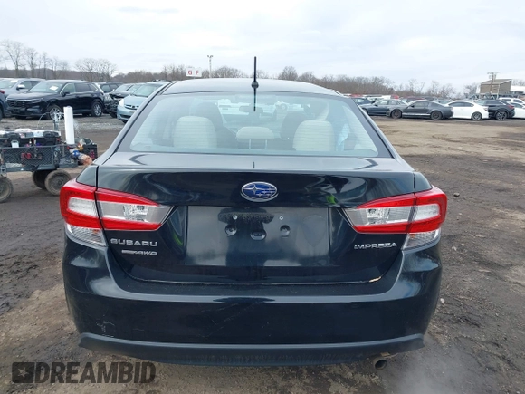 2020 Subaru Impreza with VIN 4S3GKAB69L3602396, listed as a IAAI auction lot 41621494 with 63,952 mi miles and . Bid and sale history available at DreamBid. Image 16.