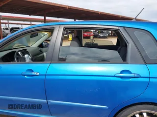 2005 Kia Spectra with VIN KNAFE161655095608, listed as a IAAI auction lot 41990765 with 51,415 mi miles. Bid and sale history available at carsss.com. Image 14.