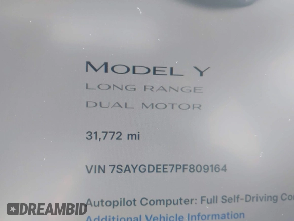 2023 Tesla Model Y Long Range with VIN 7SAYGDEE7PF809164, listed as a IAAI auction lot 41828974 with 31,772 mi miles. Bid and sale history available at carsss.com. Image 15.
