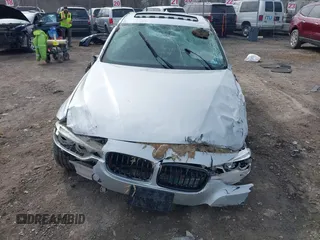 2018 BMW 3 Series 330i with VIN WBA8B9C59JEE81184, listed as a IAAI auction lot 41806952 with Not provided miles and . Bid and sale history available at DreamBid. Image 12.
