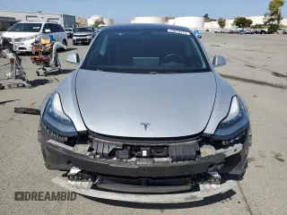 2018 Tesla Model 3 Long Range Battery z VIN 5YJ3E1EB4JF069307, wystawiony jako Copart lot #55079415 z przebiegiem 96 899 mil mil oraz Szkoda całkowita • Salvage title. Historia ofert i sprzedaży dostępna na DreamBid. Obrazek 5.