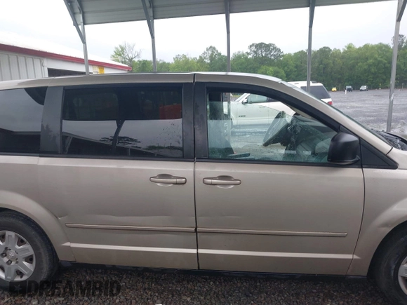 2009 Dodge Grand Caravan SE z VIN 2D8HN44E59R585342, wystawiony jako IAAI lot #42241676 z przebiegiem 329 636 mil mil oraz . Historia ofert i sprzedaży dostępna na DreamBid. Obrazek 13.