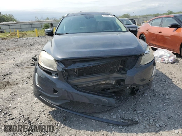 2015 Volvo XC60 T5 Drive-E Premier z VIN YV440MDK0F2741666, wystawiony jako Copart lot #53102915 z przebiegiem Nie podano mil oraz Szkoda całkowita • Salvage title. Historia ofert i sprzedaży dostępna na DreamBid. Obrazek 5.