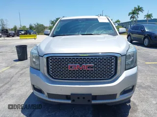 2016 GMC Yukon XL Denali with VIN 1GKS2HKJXGR423556, listed as a IAAI auction lot 42145970 with 118,436 mi miles. Bid and sale history available at carsss.com. Image 6.