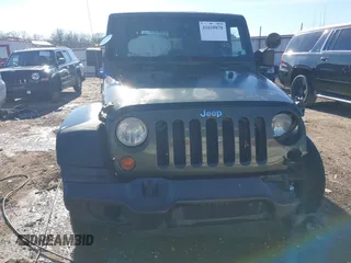 2008 Jeep Wrangler Unlimited X with VIN 1J8GA39118L594626, listed as a IAAI auction lot 41618878 with 166,071 mi miles and . Bid and sale history available at DreamBid. Image 12.