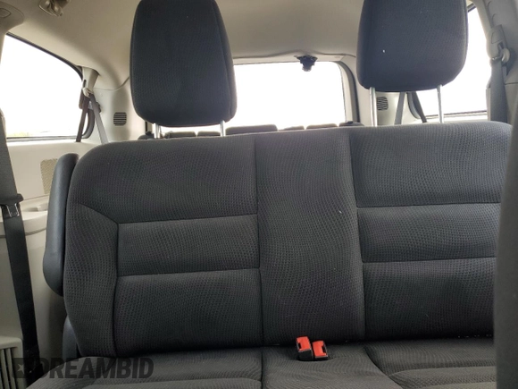 2015 Dodge Grand Caravan American Value with VIN 2C4RDGBG3FR507956, listed as a Copart auction lot 55948415 with 88,534 mi miles and Salvage Title. Bid and sale history available at DreamBid. Image 10.
