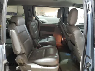 2004 Ford Freestar Limited z VIN 2FMDA58254BA54752, wystawiony jako Copart lot #89195235 z przebiegiem Nie podano mil oraz Szkoda całkowita • Salvage title. Historia ofert i sprzedaży dostępna na DreamBid. Obrazek 11.