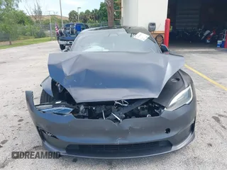 2023 Tesla Model S with VIN 5YJSA1E54PF501565, listed as a IAAI auction lot 42244953 with Not provided miles and . Bid and sale history available at DreamBid. Image 11.