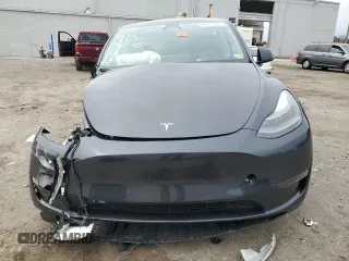 2024 Tesla Model Y с VIN 7SAYGDED1RF092027, выставлен на аукционе Copart как лот 51655485 с пробегом 22 010 миль миль и Списание • Salvage title. История ставок и продаж доступна на DreamBid. Изображение 5.