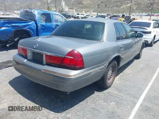 2000 Mercury Grand Marquis GS z VIN 2MEFM74W8YX662409, wystawiony jako IAAI lot #42438486 z przebiegiem 191 248 mil mil oraz . Historia ofert i sprzedaży dostępna na DreamBid. Obrazek 4.