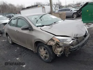 2015 Toyota Corolla L z VIN 2T1BURHE0FC468259, wystawiony jako IAAI lot #41559030 z przebiegiem 299 557 mil mil oraz . Historia ofert i sprzedaży dostępna na DreamBid. Obrazek 1.
